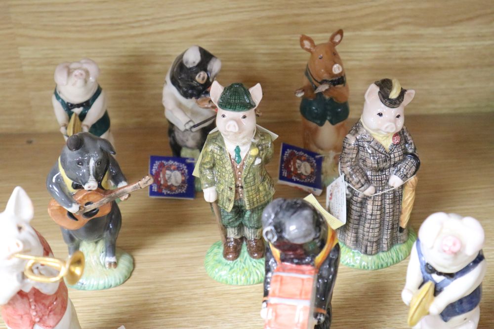 The Beswick Pig Promenade orchestra - eleven instrumentalists and two Beswick English Folk pigs